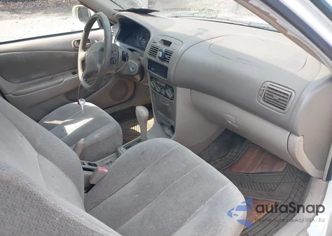 2001 Toyota Corolla Le из США, поврежденный, VIN 2T1BR12E81C451844